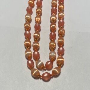 Elegant Pearl Necklace in Peach
